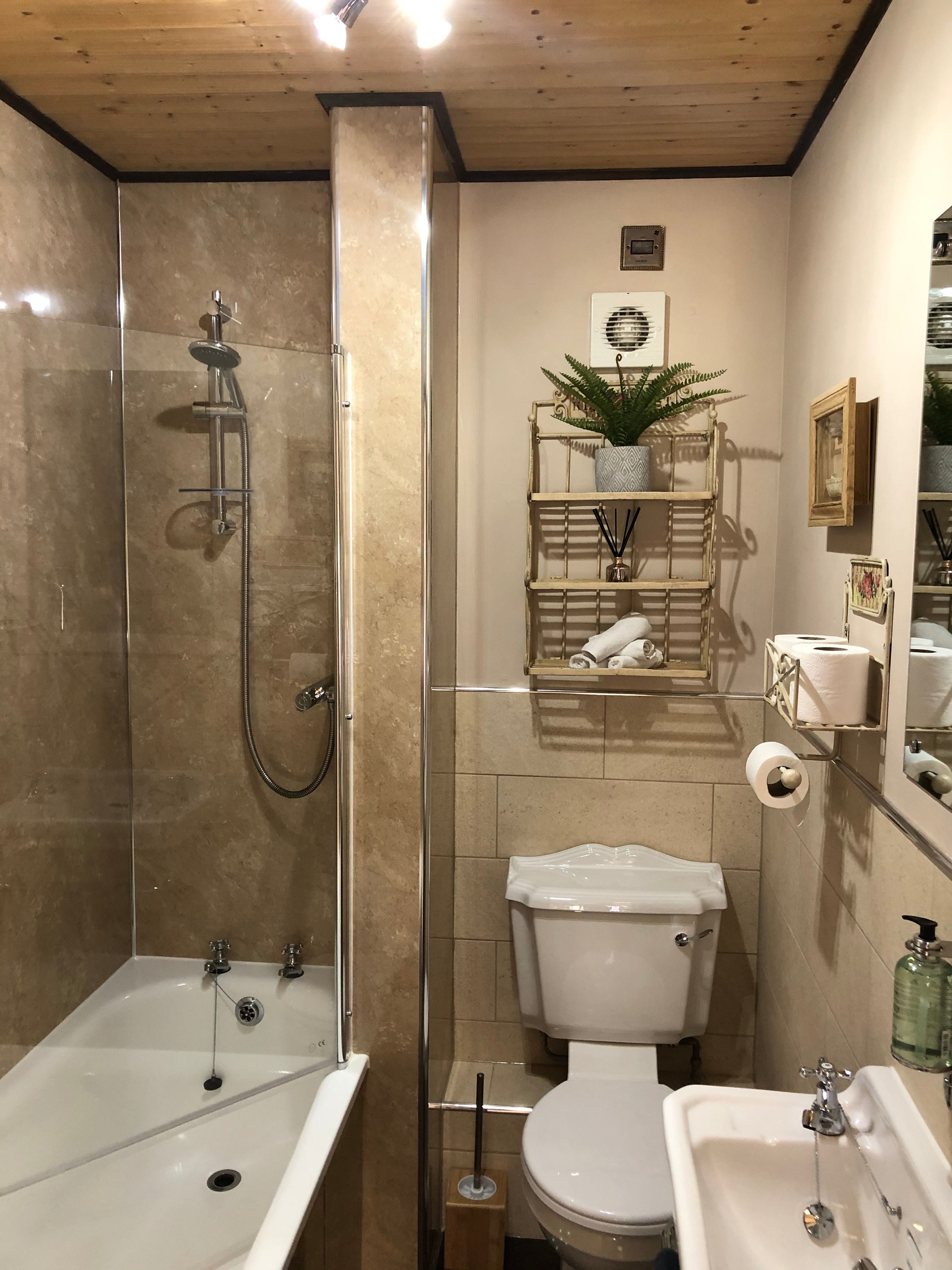 Bathroom with mains power shower 